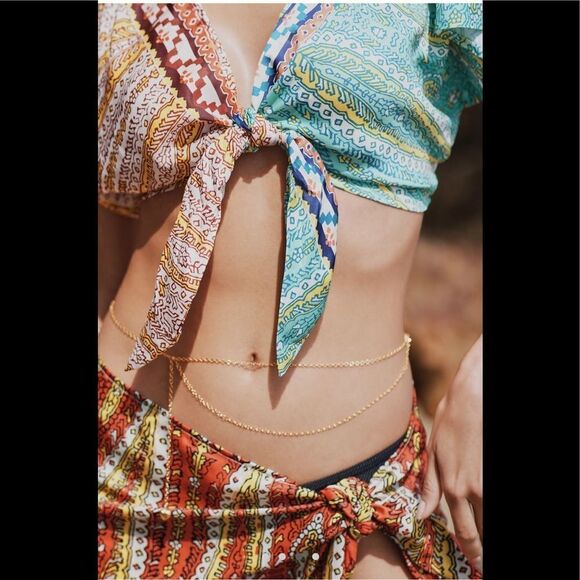 Two-Piece Twist Top and Wrap Skirt Set
Anthropologie - Picture 2 of 4